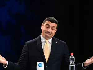 George Simion, expunându-şi teoriile, într-o emisiune televizată - Foto: Profimedia Images