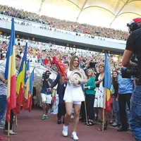 Iulie 2019–pe Arena Națională din București, cu trofeul de la Wimbledon