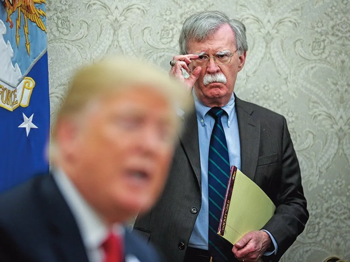 Luptătorii kurzi sunt acum utili lui John Bolton (dreapta) pentru a ține Turcia în șah