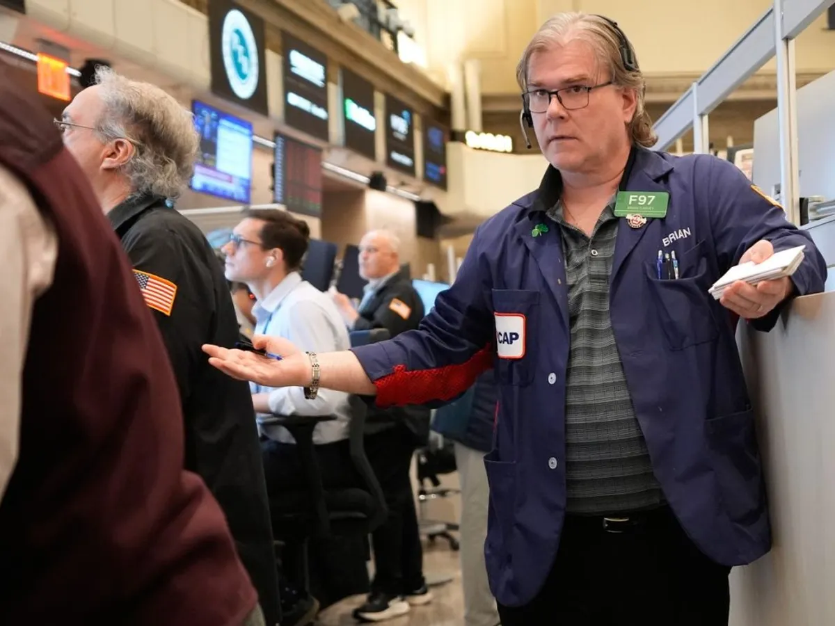 Traderi urmărind îngrijoraţi evoluţia indicilor bursieri de pe NYSE - Foto: Profimedia Images