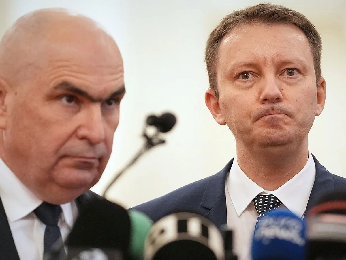 Premierul ad-interim Ilie Bolojan şi eurodeputatul Siegfried Mureşan - Foto: Profimedia Images