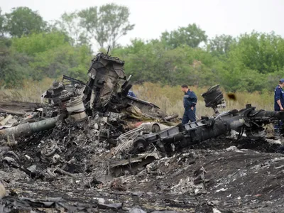 Rusia, vinovată pentru doborârea zborului MH17, tragedie care a dus la moartea a 298 de persoane - Foto: Profimedia images