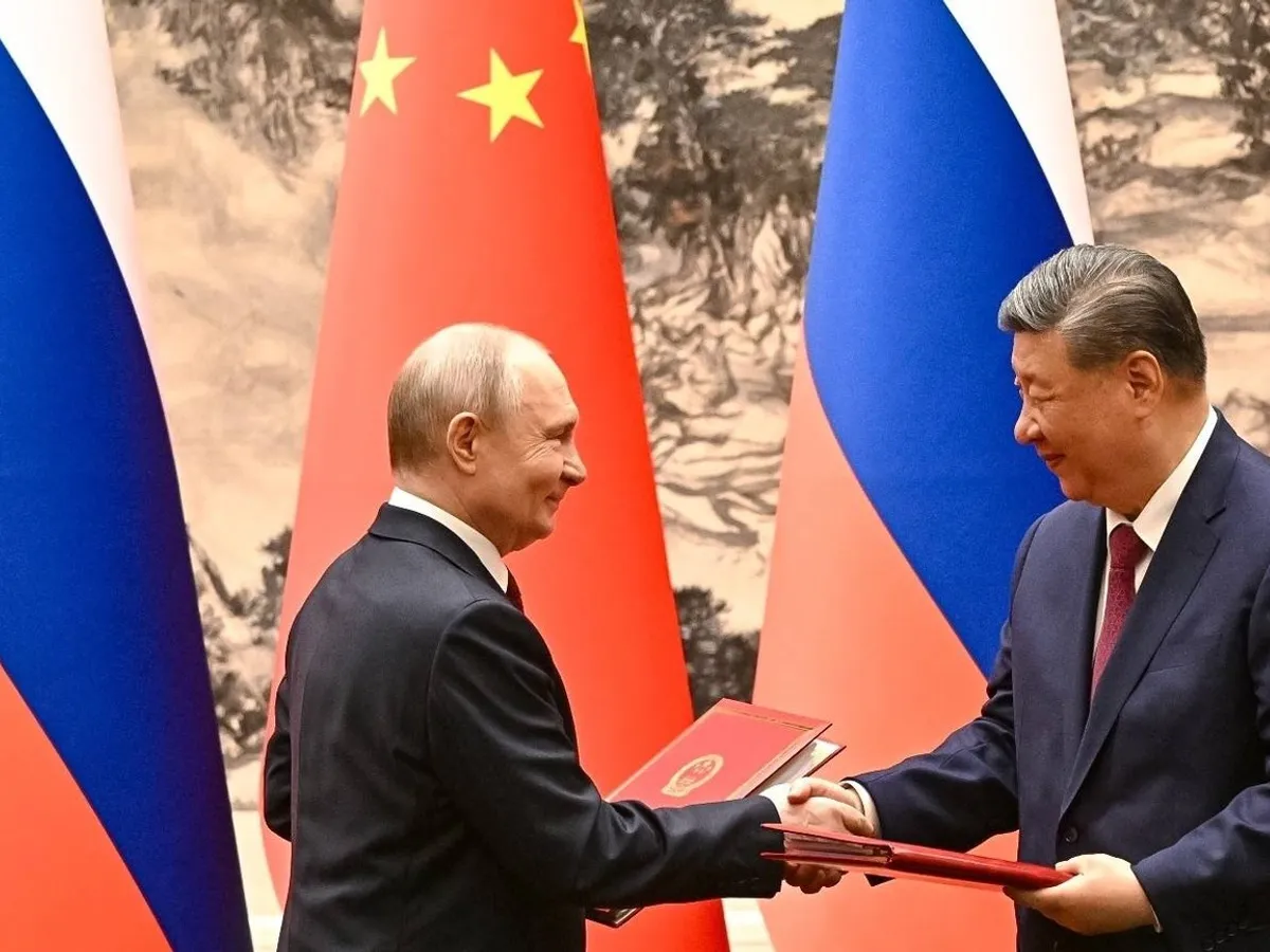 Vladimir Putin și Xi Jinping - Foto: Profimedia images