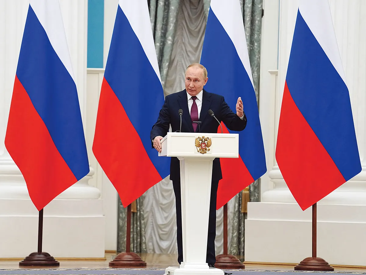 Vladimir Putin la conferința de presă comună cu Olaf Scholz, cancelarul Germaniei, venit la Moscova cu zece zile înainte de invadarea Ucrainei,
în încercarea de a media pacea - Foto: Getty Images