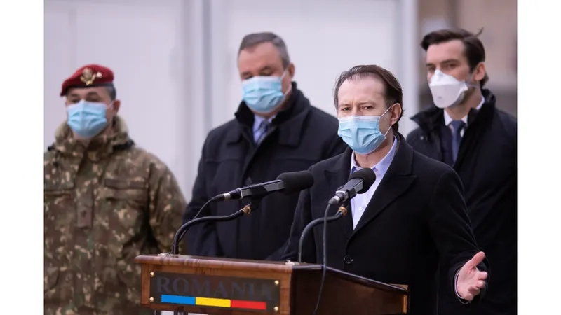 Premierul Cîțu a fost prezent la livrarea primei tranșe de vaccin/FOTO: gov.ro