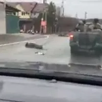 Cadravrele civililor au fost lăsate în stradă/ FOTO: Captură video