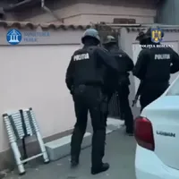 Poliția face percheziții - Foto: captură video (rol ilustrativ)