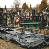 Imaginile cu cadavrele lăsate în urmă de armata rusă după retragerea din Bucea au îngrozit opinia publică din toate colțurile lumii - Foto: Getty Images
