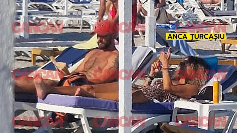 Anca Țurcașiu înflorește la 54 de ani. Surprinsă pe plajă cu un tânăr musculos și tatuat - Foto: cancan.ro