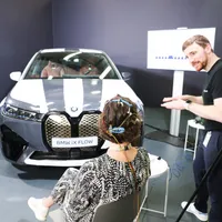 Start-up-ul Brainboost din München a reușit, cu ajutorul unui electroencefalograf, să determine schimbarea culorii vopselei high-tech E Ink, prezentată experimental de BMW pe modelul BMW iX Flow. / Foto: BMW