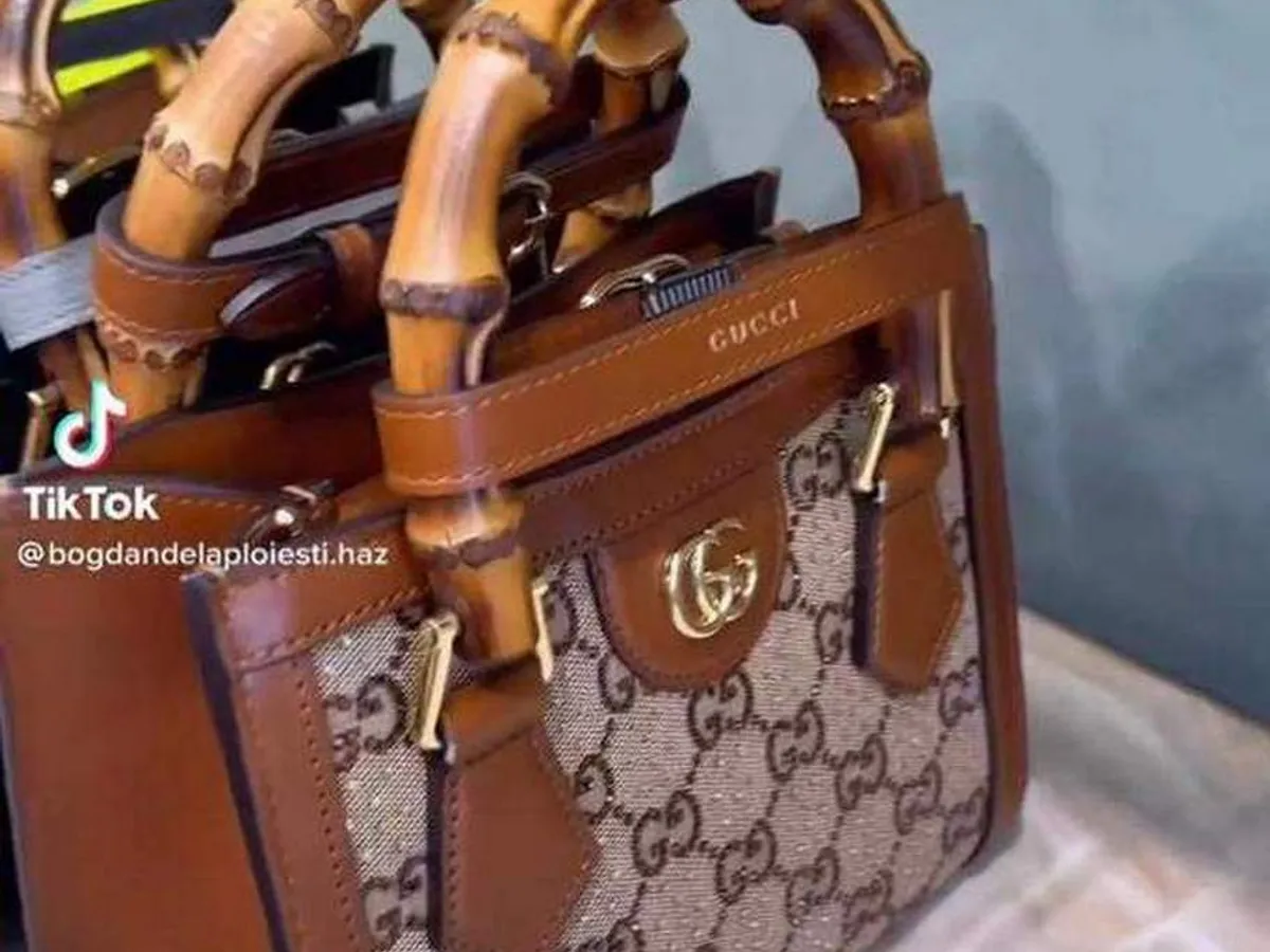 Poșeta Gucci primită de Cristina Pucean de la manelistul Bogdan de la Ploiești. - Foto: spynews.ro