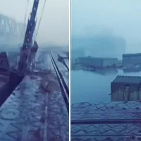 HIMARS a distrus podul peste râul Oskil. Vagoane cu muniție rusești plutesc în râu - FOTO: Twitter/Giorgi Revishvili