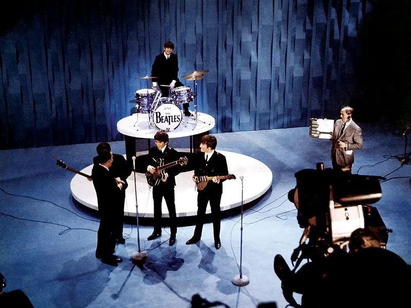 TWIST AND SHOUT Beatlemania în Statele Unite a explodat în urma apariției cvartetului la The Ed Sullivan Show și în Newsweek.