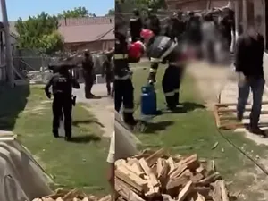 Momentul în care o femeie este salvată de luptătorii SIAS. Încerca să dea foc la casă - Foto: Captură video facebook/ Poliția Română