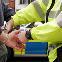 Bărbat reținut de poliție - Foto: Profimedia Images - Caracter ilustrativ