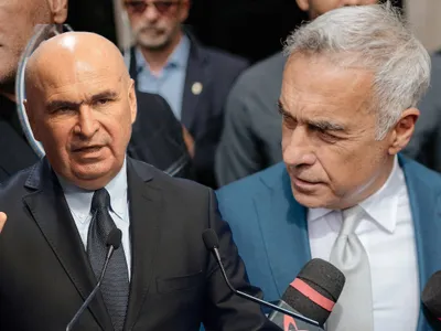 Ilie Bolojan și Călin Georgescu - Foto: Profimedia images