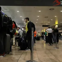 Aeroporturile lumii sunt în avceastă perioadă adevărate poligoane de testare a nervilor pasagerilor/Foto: Valeria Mongelli/Bloomberg