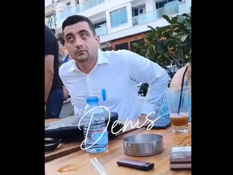 George Simion se relaxa la terasă în Cipru când fanii AUR se băteau cu jandarmii în București - Foto: captură video