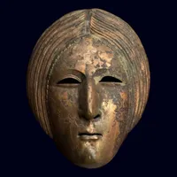 FOTO Misterul măștii de bronz descoperită în România. Veche de sute de ani, reprezintă o femeie - Foto: Facebook/ Muzeul Național de Istorie a Transilvaniei