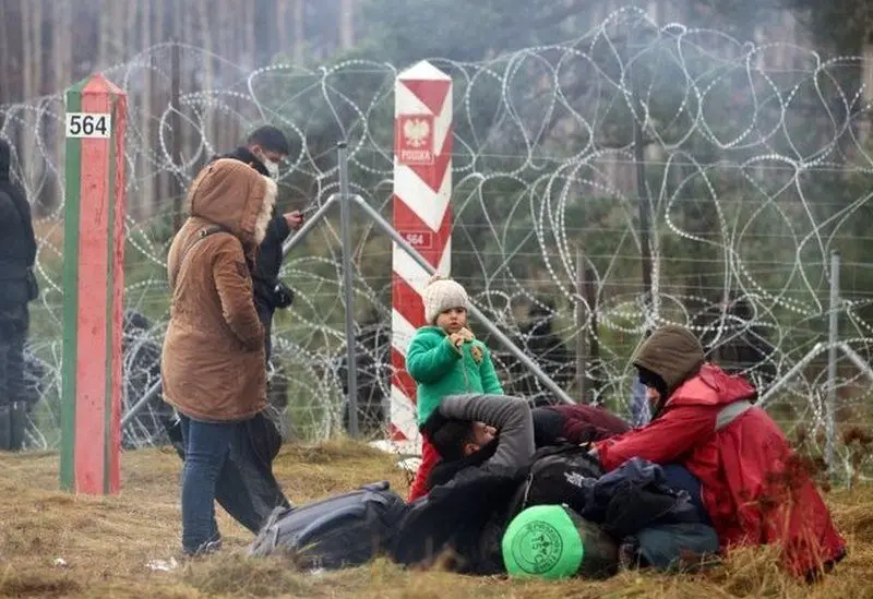 Belarusul acuză Polonia de agresarea migranţilor de la frontiera celor două state/FOTO: bbc.com