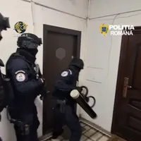 Percheziții - Foto: Poliția - DIICOT