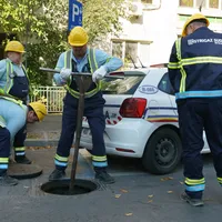 Operatori Distrigaz după explozie - FOTO Inquam Photos / Tudor Pană