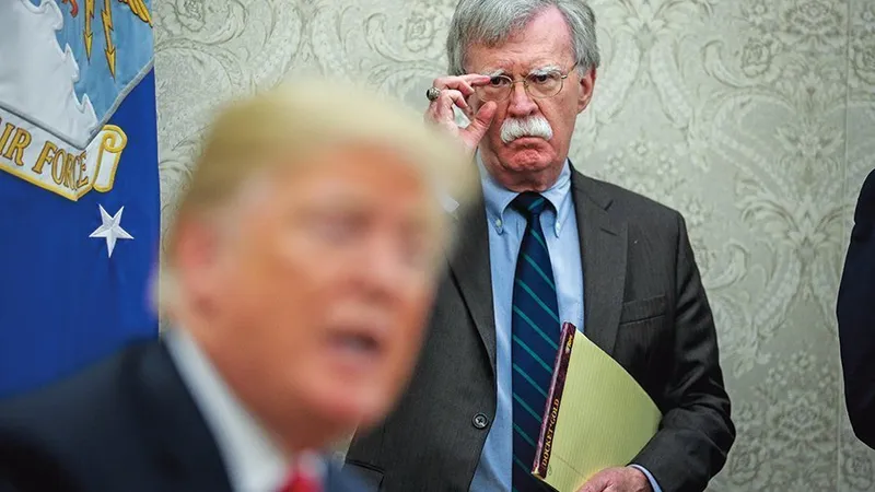 Luptătorii kurzi sunt acum utili lui John Bolton (dreapta) pentru a ține Turcia în șah