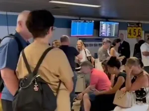 Sute de pasageri au așteptat ore în șir bagajele pe Aeroportul Otopeni: „Management dezastruos” Foto: captura video Antena3