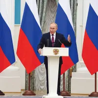Vladimir Putin  la conferința de presă comună cu Olaf Scholz, cancelarul Germaniei, venit la Moscova cu zece zile înainte de invadarea Ucrainei,  în încercarea de a media pacea - Foto: Getty Images