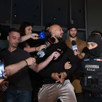 Frații Tate, reținuți după audieri într-un dosar de crimă organizată și trafic de persoane - Foto: INQUAM Photos/Sabin Cirstoveanu