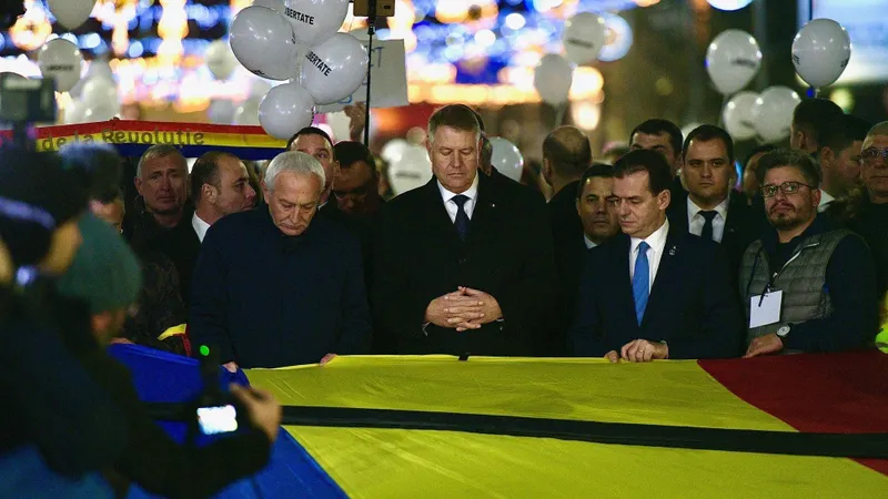 Klaus Iohannis și Ludovic Orban la comemorarea Revoluției Foto: Facebook