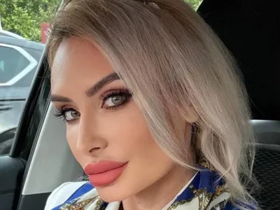 Imagini din flagrantul DNA. Avocata din PNL, surprinsă când primea 60.000 de euro alături de un fals general SIE