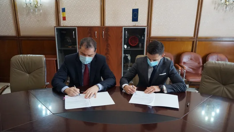 Eduard Novak (stânga), ministrul Sportului a semnat preluarea Stadionului Național de Rugby Arcul de Triumf  de la CNI, companie aflată în subordinea colegului său de la UDMR, ministrul Dezvoltării, Atilla Czeke Foto: Facebook
