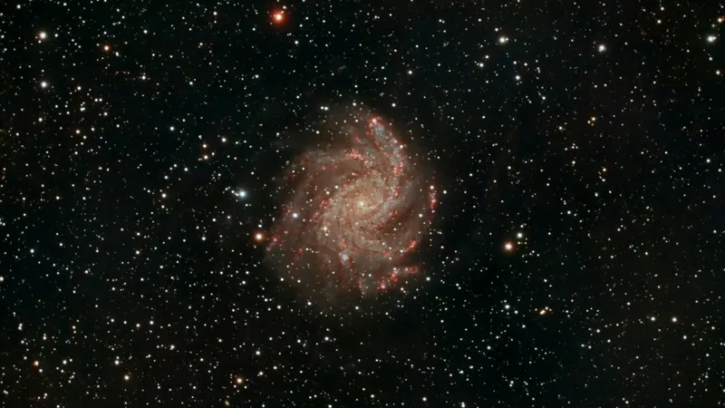 Imagine prin telescop a galaxiei NGC 6946 - Foto: Pexels/Daniel Cid