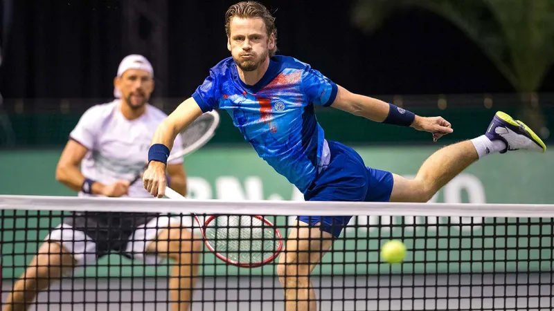 Perechea compusă din tenismanul român Horia Tecău şi germanul Kevin Krawietz s-a calificat în sferturile de finală ale probei de dublu din cadrul turneului ATP de la Rotterdam. / Foto: atptour.com