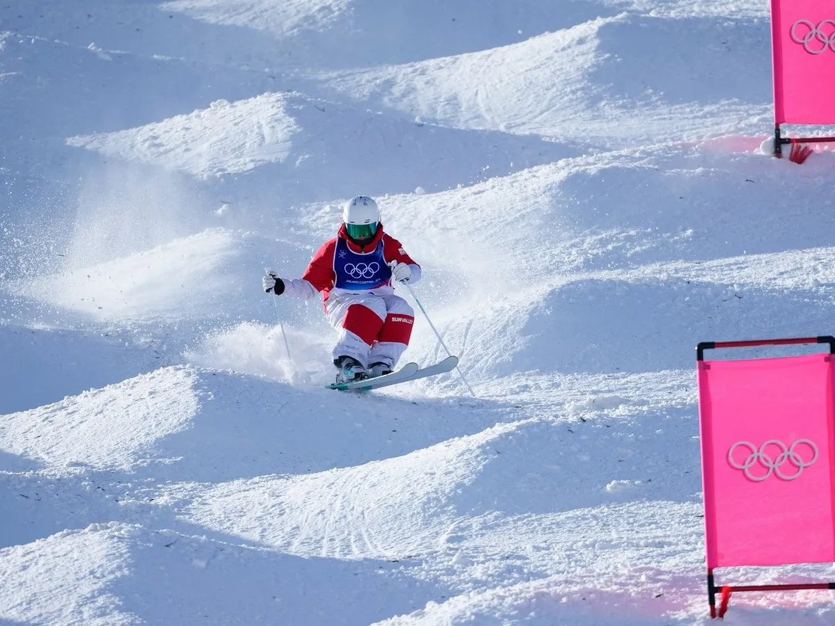 JO 2026 - Schi acrobatic: Surprinzătorul australian Cooper Woods, medaliat cu aur la movile masculin - Foto: Profimedia Images