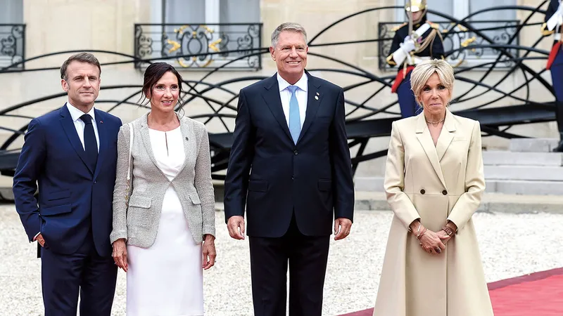 Klaus Iohannis și soția sa, Carmen, la recepția pentru șefii de stat și de guvern găzduită de Președintele Emmanuel Macron cu prilejul ceremoniei de deschidere a Jocurilor Olimpice de la Paris 2024 - Foto: Profimedia Images