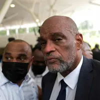 Premierul haitian a supraviețuit unei tentative de asasinat. Atentatul a avut loc la o biserică/FOTO: TheGuardian