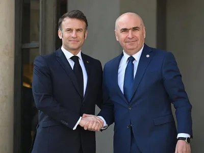 Ilie Bolojan a fost primit de Emmanuel Macron, la Summitul Bunăvoinţei, de la Paris - Foto: Profimedia Images