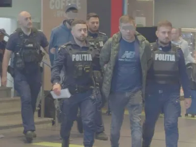 Persoane implicate în scandal, ridicate de polițiști -Foto: Captură video amator