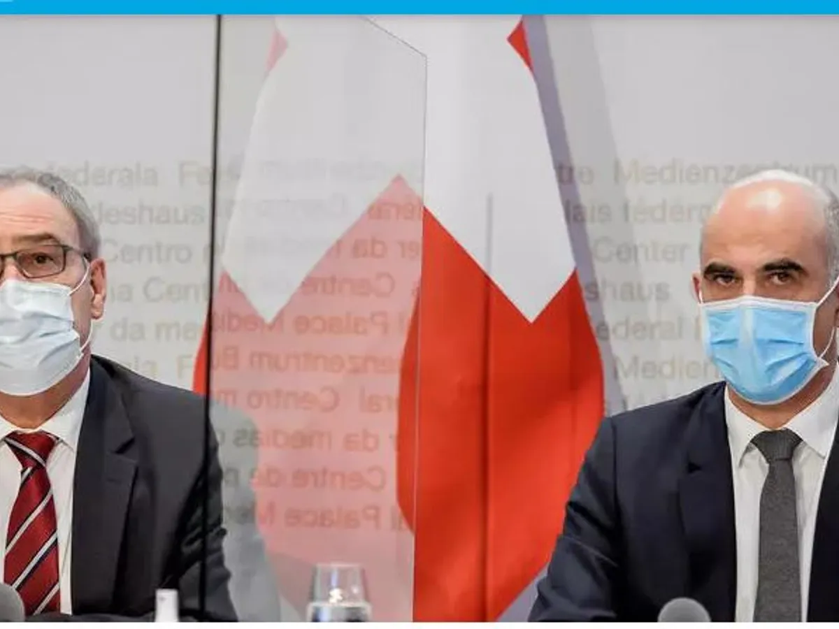 Președintele Guy Parmelin și ministrul Sănătății Alain Berset/AFP