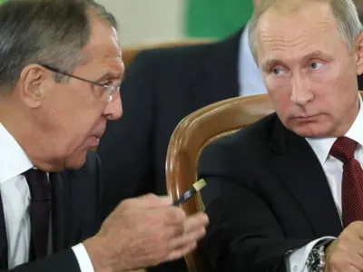 Serghei Lavrov, ministrul de Externe rus, și Vladimir Putin/FOTO: Getty