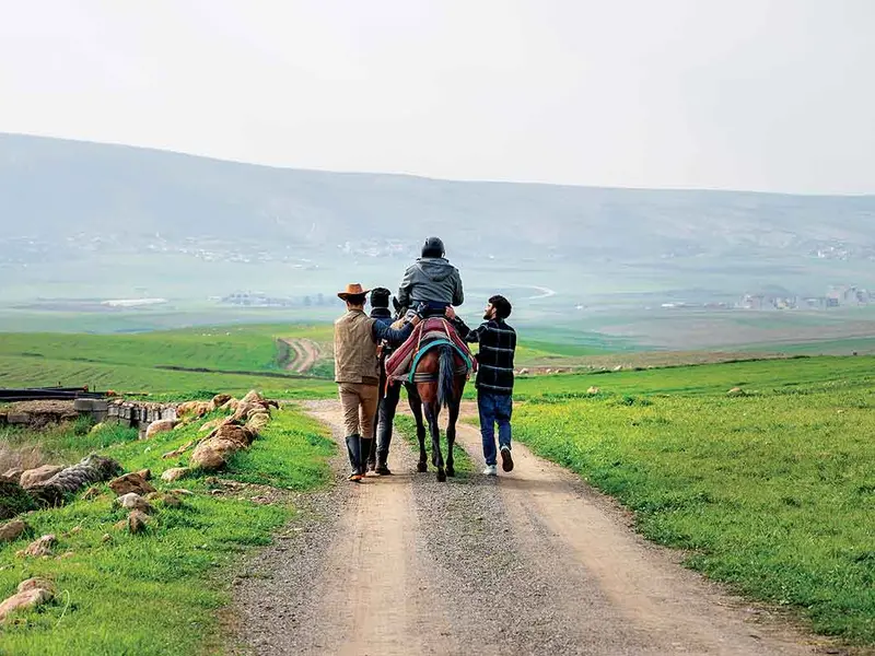 Daxil Aido, 46 de ani, are o lecție de călărie la centrul ecvestru Horses for Hope