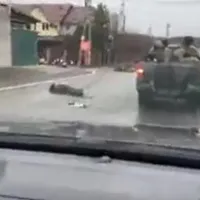 Imaginile cu morți pe străzile orașului ucrainean Bucha după retragerea armatei ruse - Foto: Twitter/NEXTA