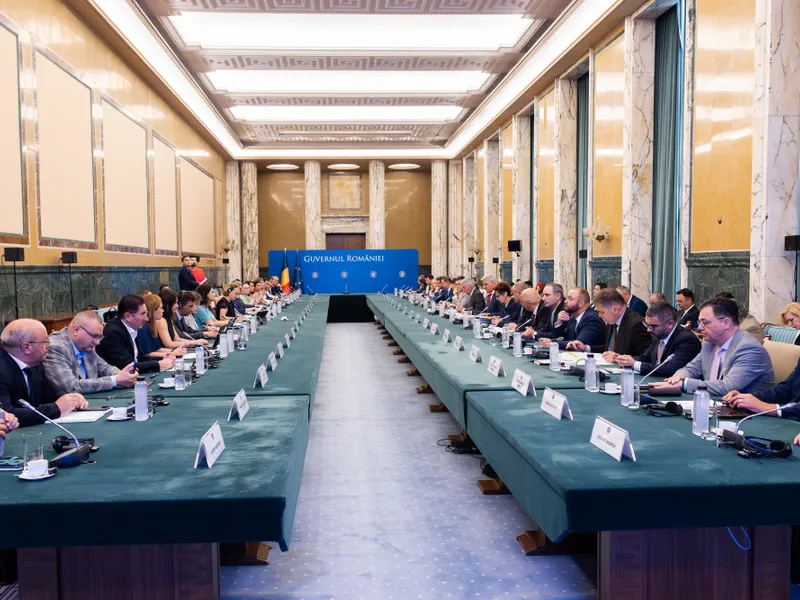 Ședință în Coaliție pentru al doilea pachet de măsuri fiscale. Sunt tensiuni între PSD și Bolojan - Foto: gov.ro (rol ilustrativ)