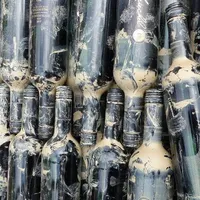 „Vinul viiturii”. Germanii vând sticle acoperite de nămol, ca să acopere pagubele de la inundații