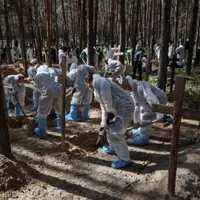 Groapa comună de la Izium - Foto: Gleb/Reuters