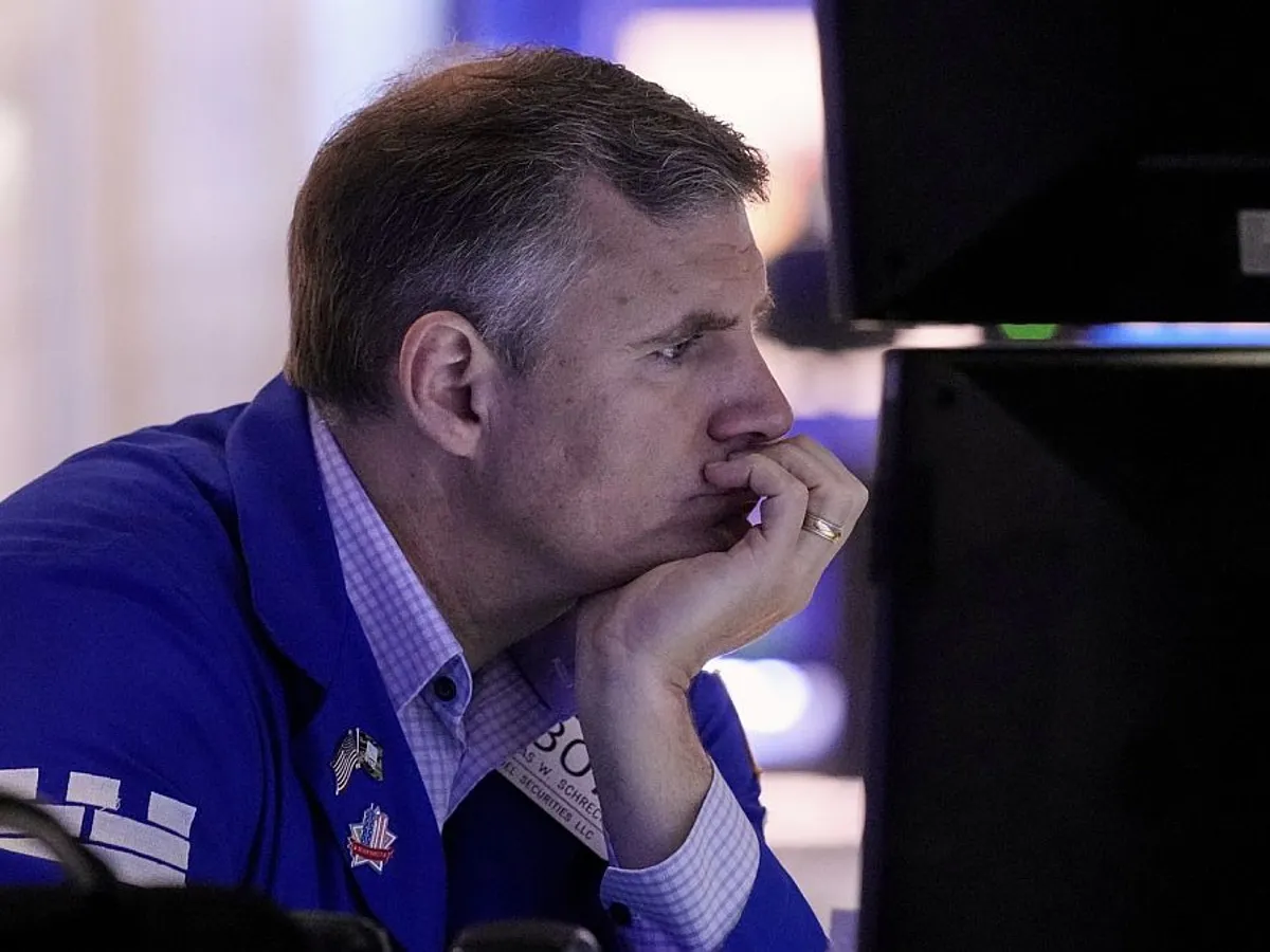 Trader, într-o zi de lucru, la New York Stock Exchange - Foto: Profimedia Images