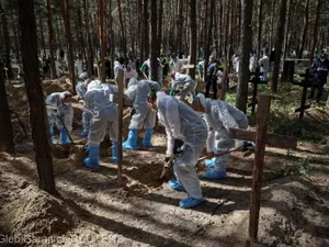 Groapa comună de la Izium - Foto: Gleb/Reuters