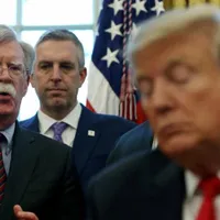Bolton și Trump/FOTO: aljazeera.com